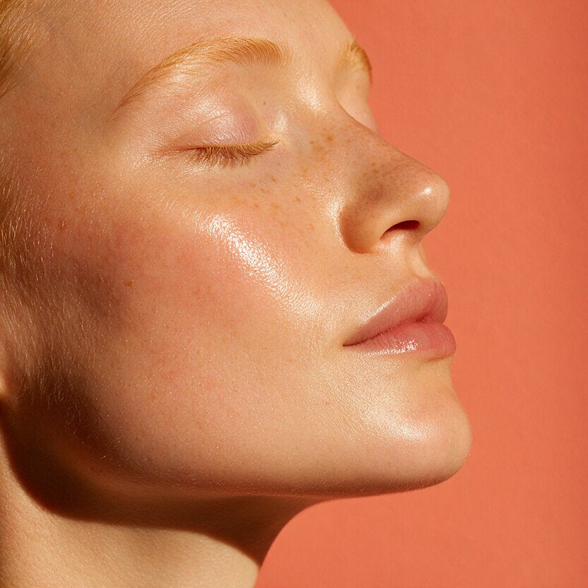 Model with serum in warm light